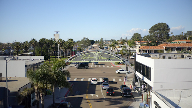 Push in shot of Cedro Avenue Design District sign close up in Solana Beach | Drone Video