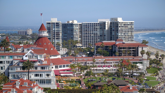 Aerial view of the beach, palm trees and the ocean at Hotel Del Coronado.