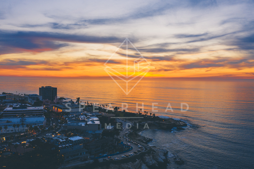 Aerial view of the cliffs, the ocean and homes at La Jolla Cove.