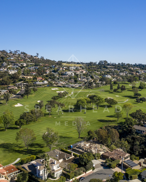 Aerial view of a residential street, homes and the buildings in Downtown San Diego.
