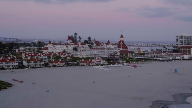 Aerial view of the beach, the ocean and homes at Coronado Beach.