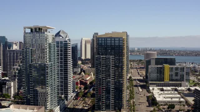 Aerial view of the downtown streets, the skyline and palm trees at Waterfront.