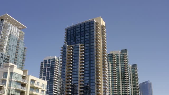 Low aerial view of the downtown streets, the skyline and the buildings at Waterfront.