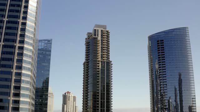 Low aerial view of the downtown streets, the skyline and the buildings at Waterfront.