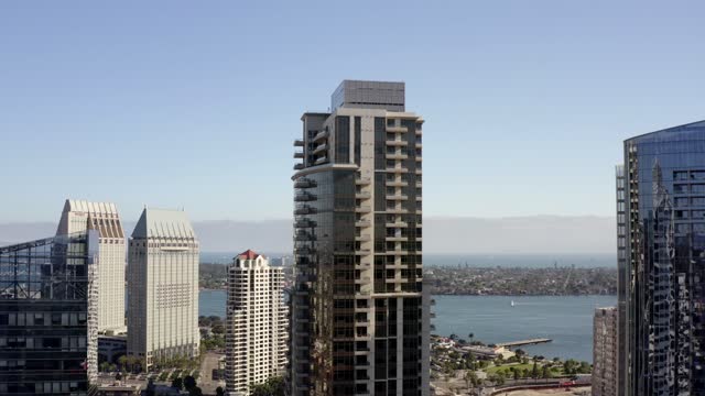 Aerial view of the downtown streets, the skyline and boats at Waterfront.