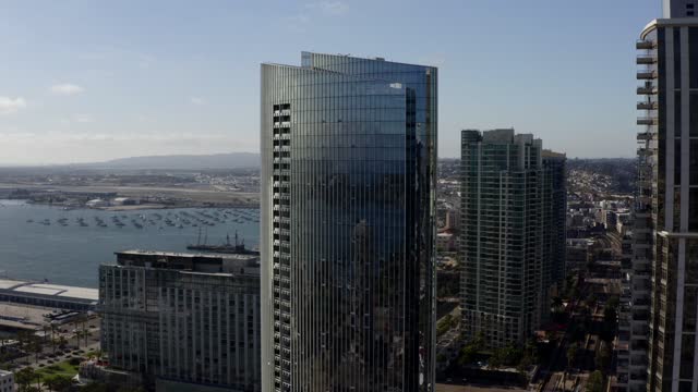 Aerial view of the downtown streets, the skyline and boats at Waterfront.