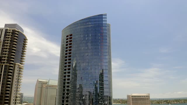 Low aerial view of the downtown streets, the skyline and the buildings at Waterfront.