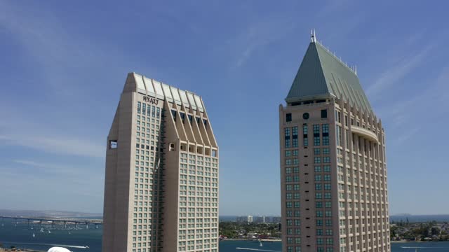 Low aerial view of the downtown streets, the bridge and the skyline at Marina.