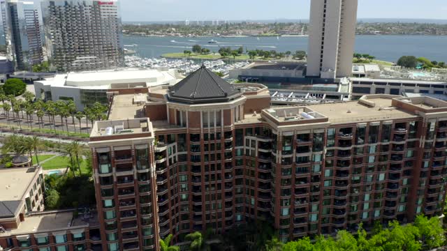Aerial view of the downtown streets, the skyline and boats at Marina.