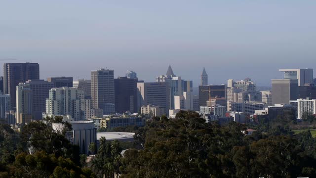 The downtown streets, the skyline and the buildings in Balboa Park.