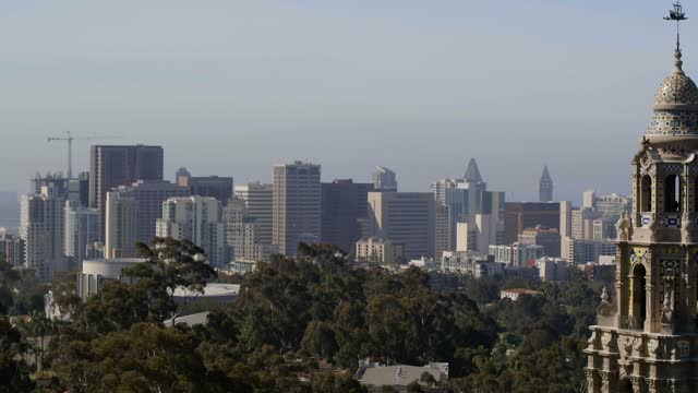 The downtown streets, the skyline and the buildings in Balboa Park.