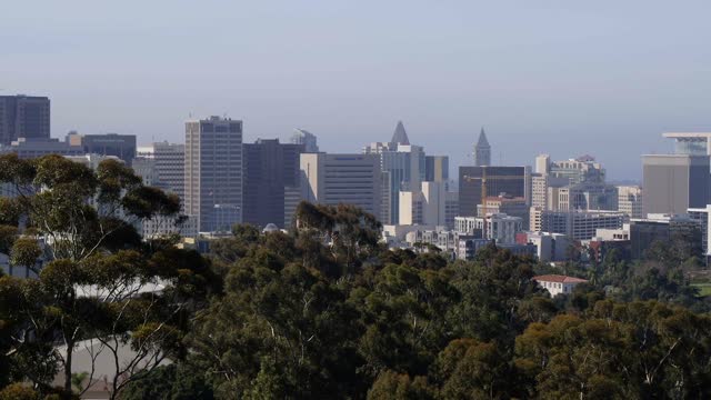 The downtown streets, the skyline and the buildings in Balboa Park.