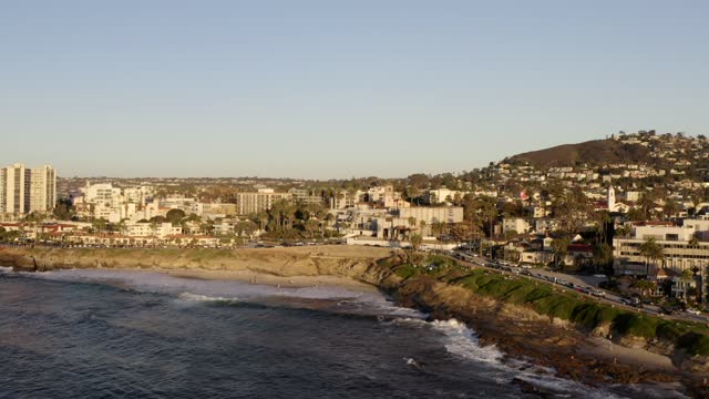 Aerial view of the cliffs, the ocean and homes at La Jolla Cove.