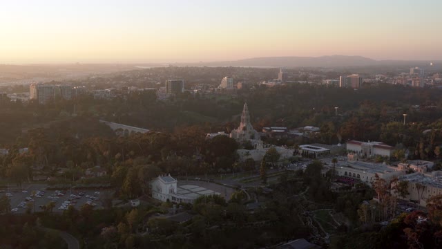 Aerial view of a park, the skyline and homes in Balboa Park.