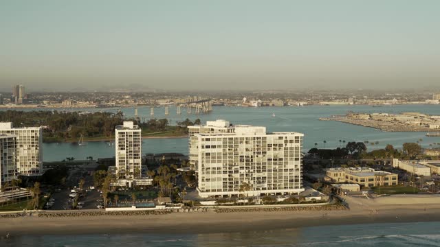 Aerial view of the beach, the bridge and boats at Coronado Beach.
