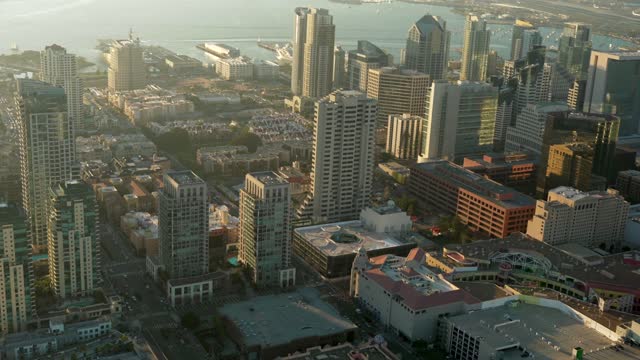Aerial view of the downtown streets, the skyline and boats at Marina.