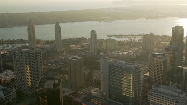 Aerial view of the downtown streets, the skyline and boats at Marina.