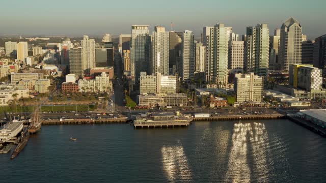 Aerial view of the downtown streets, the skyline and boats at Marina.