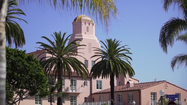 The downtown streets, palm trees and the buildings at La Jolla Cove.