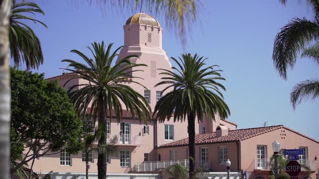 The downtown streets, palm trees and the buildings at La Jolla Cove.