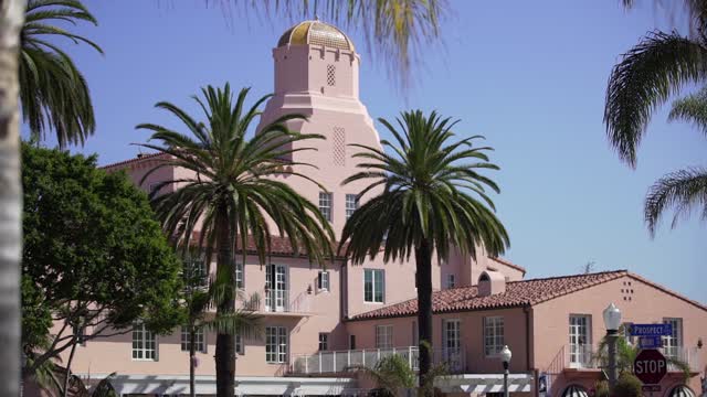 The downtown streets, palm trees and the buildings at La Jolla Cove.