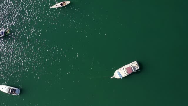 Aerial view of the harbor, boats and the bay in Point Loma, with boats out.