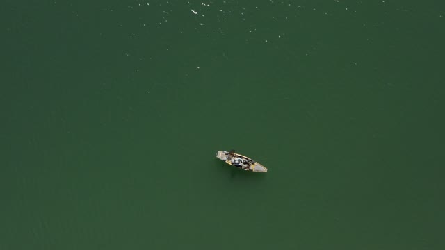 Aerial view of the harbor, boats and the water in Point Loma, with boats out.