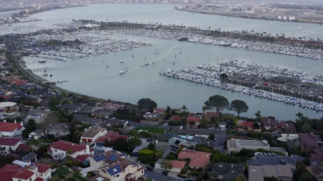 Aerial view of the harbor, the skyline and boats in Point Loma.