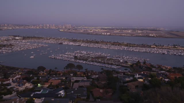 Aerial view of the harbor, the skyline and boats in Point Loma.