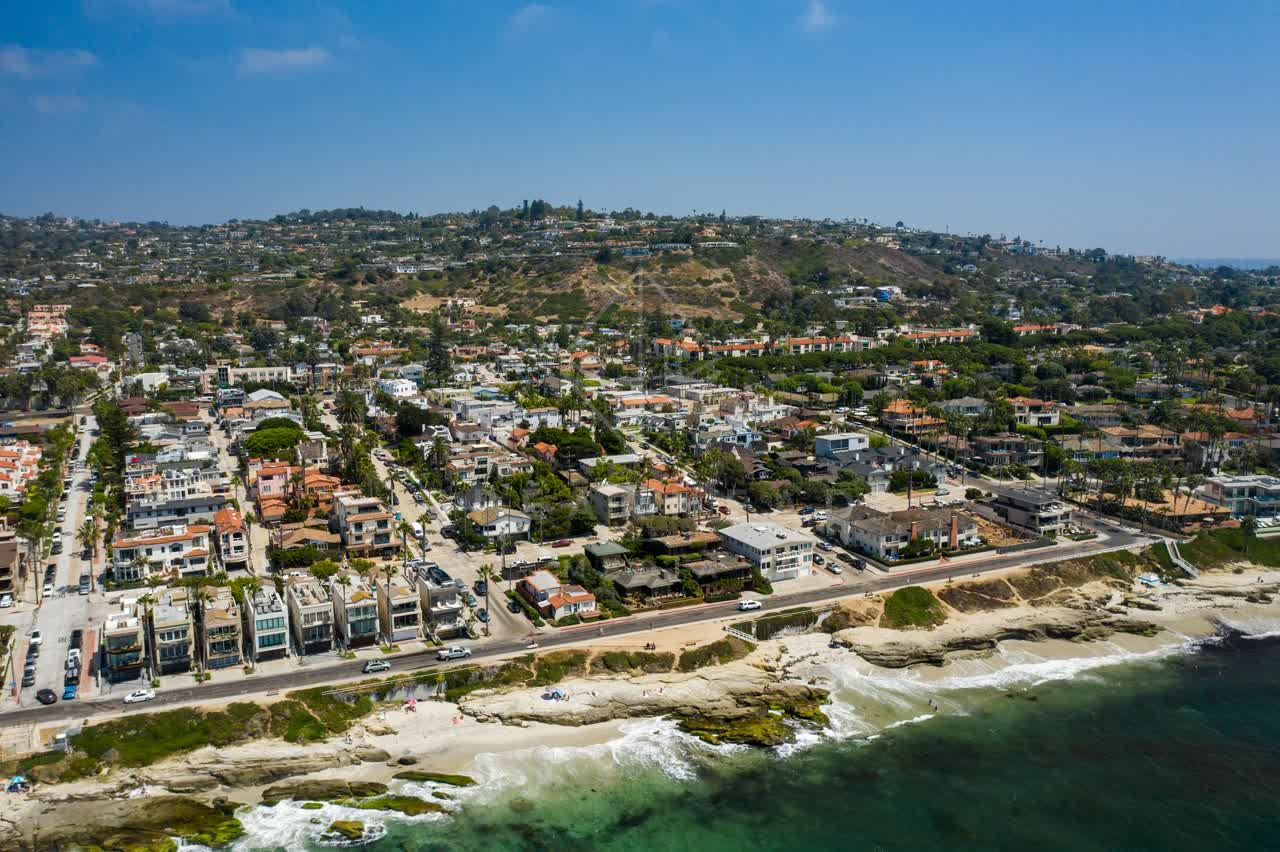 Aerial view of a residential street, the ocean and homes at Windansea.