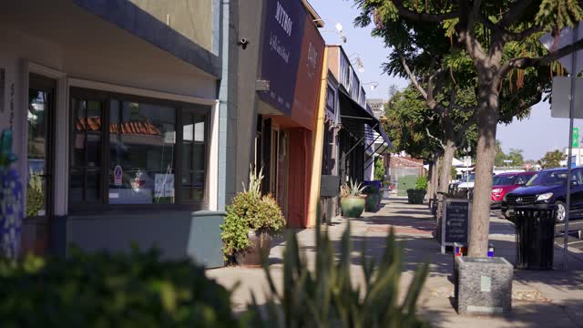 The downtown streets, the buildings and traffic at Bird Rock.