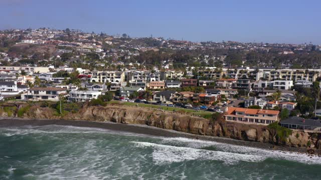 Aerial view of the cliffs, the ocean and homes at Bird Rock.