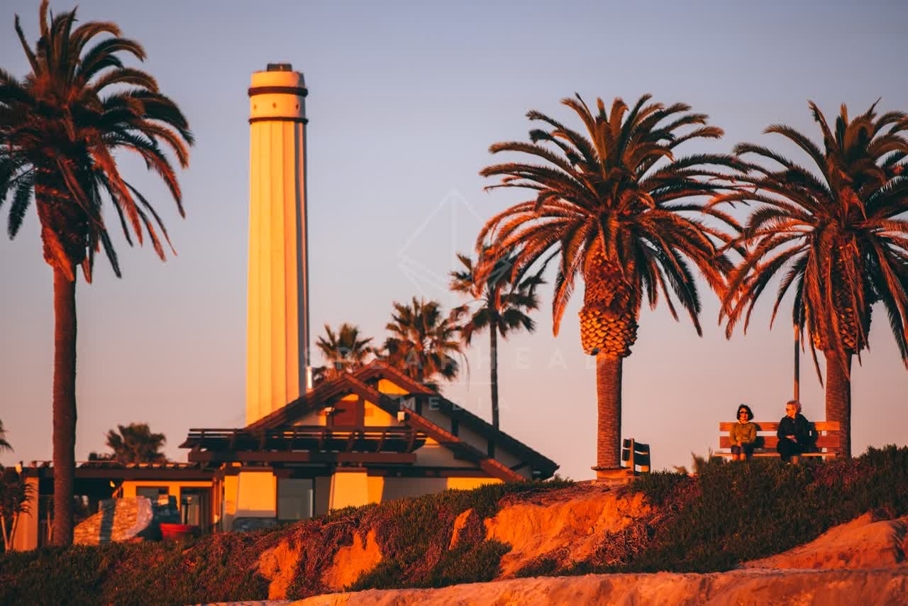 A park, palm trees and the buildings in Del Mar.