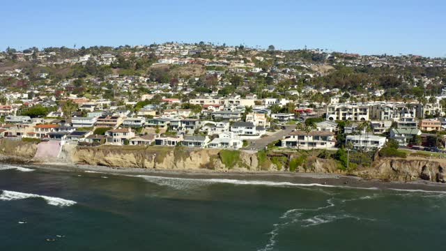 Aerial view of a residential street, palm trees and the ocean at Bird Rock.