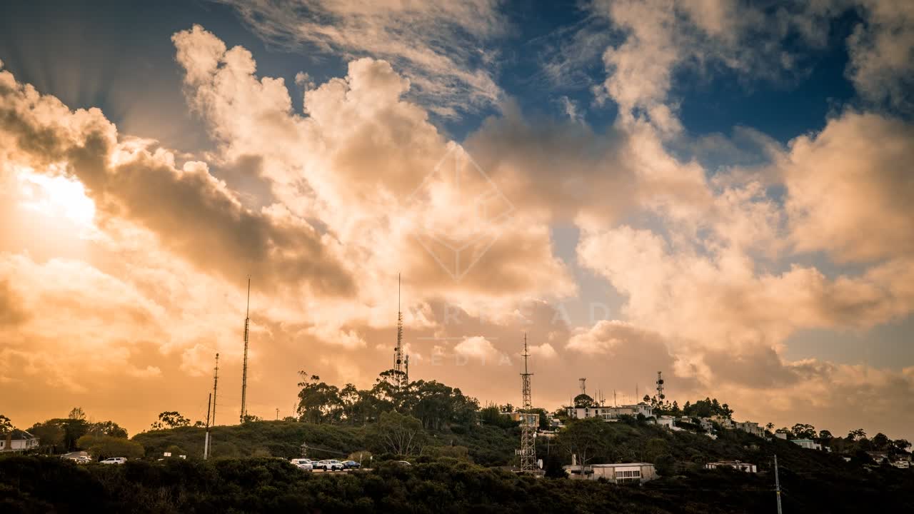 A residential street, homes and traffic at Mount Soledad.