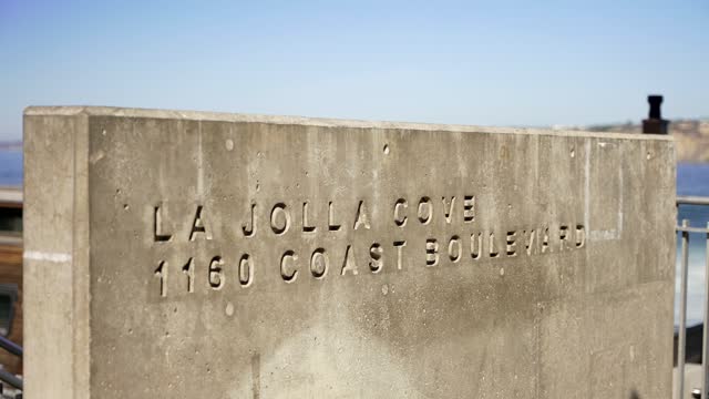 Close view of the beach, the ocean and the water at La Jolla Cove.