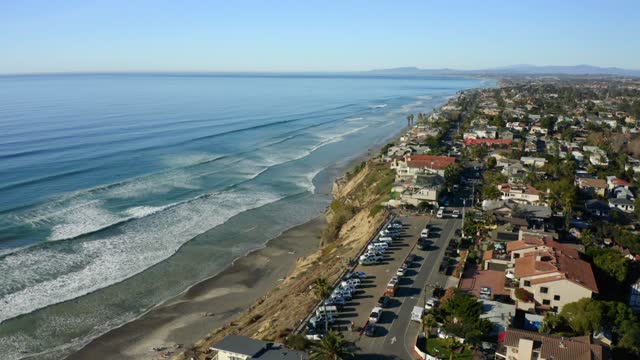 Aerial view of the cliffs, the surf and the ocean at Leucadia.