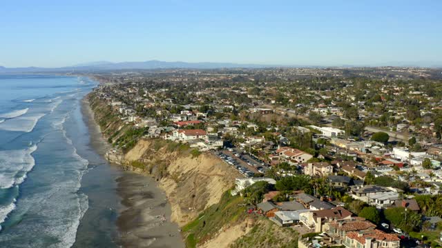 Aerial view of the cliffs, the surf and the ocean at Leucadia.