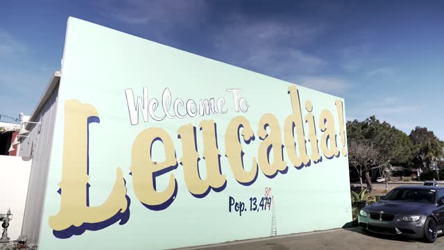 The downtown streets, the buildings and traffic at Leucadia.
