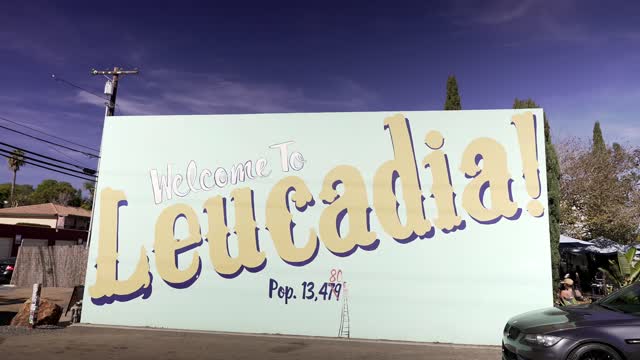 The downtown streets, the buildings and traffic at Leucadia.