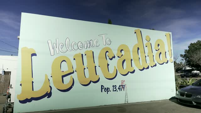 The downtown streets, the buildings and traffic at Leucadia.