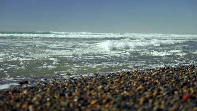 View from the water of the beach, the surf and the ocean at Leucadia.