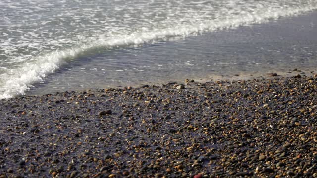 Close view of the beach, the surf and the ocean at Leucadia.