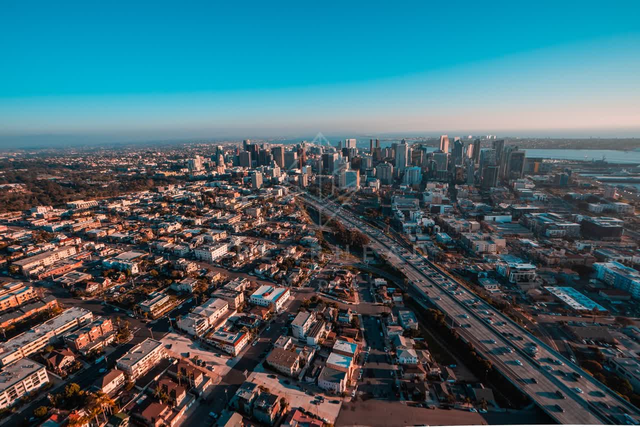 Aerial view of the downtown streets, the skyline and homes at San Diego Marina.