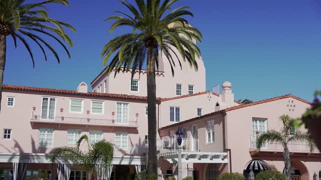The downtown streets, palm trees and the buildings at La Jolla Cove.