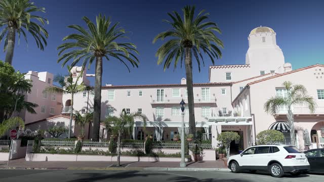 The downtown streets, palm trees and the buildings at La Jolla Cove.