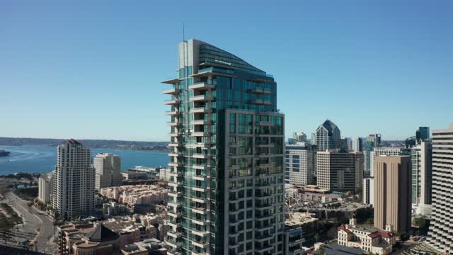 Aerial view of the downtown streets, the skyline and boats at Marina.