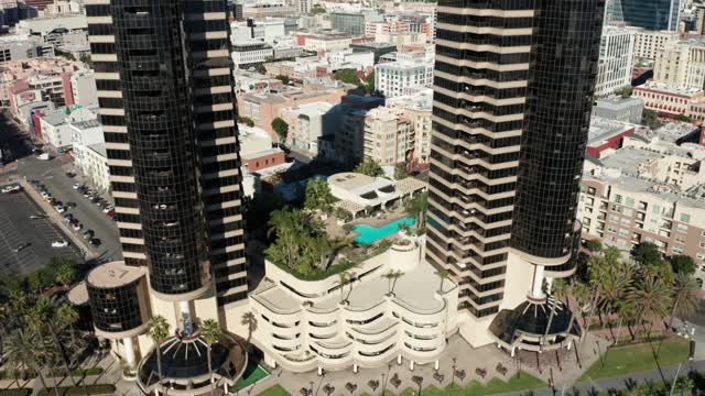 Aerial view of the downtown streets, the skyline and palm trees at Marina.