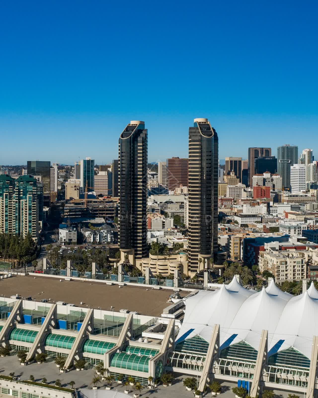 Aerial view of the downtown streets, the skyline and palm trees at San Diego Marina.
