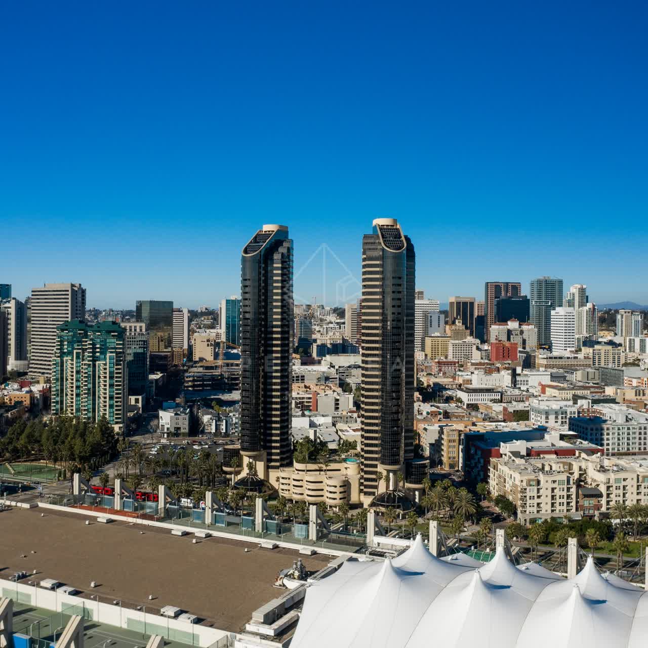 Aerial view of the downtown streets, the skyline and palm trees at San Diego Marina.